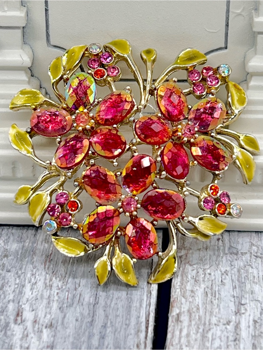 331. Vintage Floral Red Rhinestone Brooch with Green Enamel Leaves